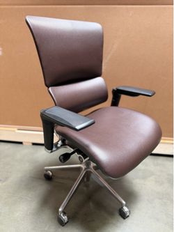 Brand new leather X chair with chrome frame and dark brown leather upholstery, brand new out of the box