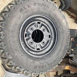 Polaris Brutus hd times and tires tires are warn three hold air and 1 doesn’t but rims are in good shape