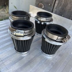 4–AIR FILTERS SIZE IS IN THE PICTURES IN VERY GOOD CONDITION USED VERY LITTLE
