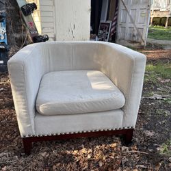 Two Upholstered Cream Colored Chairs