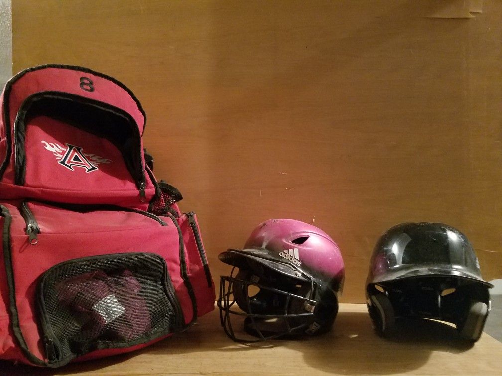 Baseball bag and two helmets