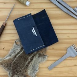 Leather wallet, hand stitched