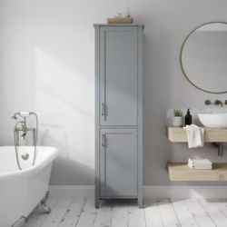 The Teamson Home Mercer Mid-Century Modern freestanding linen tower cabinet delivers tall, space-saving storage with clean lines and versatile functio