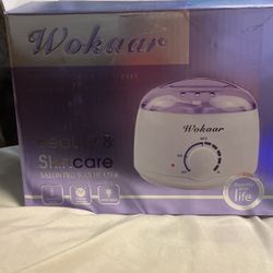 Hair Remova Wax Pot. Purple Never Used. Comes With Wax And Sticks 