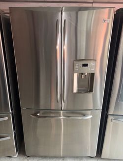 GE Stainless Steel Refrigerator And Freezer