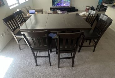 Dark brown dining table set