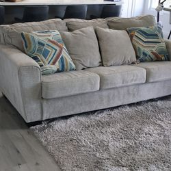 Ashley Furniture Grey-beige Sleeper Sofa Queen Size and four pillows set
