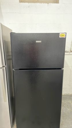Hotpoint refrigerator top and bottom black