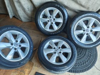 16" NISSAN WHEELS  versa Sentra  hard to find 16"