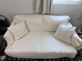 Ivory two seater couch