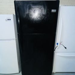 Frigidaire refrigerator 30X69X29 with a receipt for a 90-day warranty