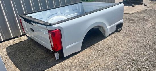 Ford long bed, new take off. Have fork lift or can deliver