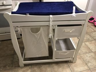 Baby changing table with padding included