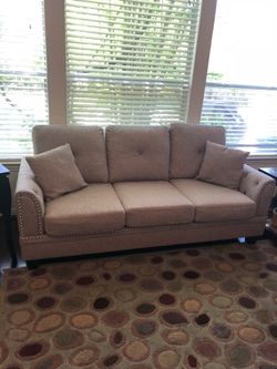 GENTLY USED FABRIC SOFA AND LOVE SEAT WITH NAILHEAD TRIM