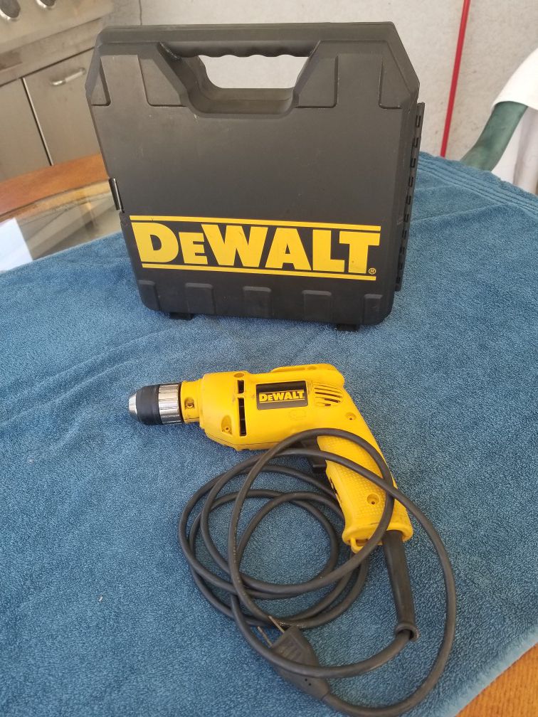 DEWALT DW106 3/8-Inch Heavy Duty Variable-Speed Reversing 5.4 Amp Drill.