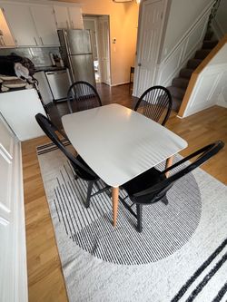 Dinner table and four chairs