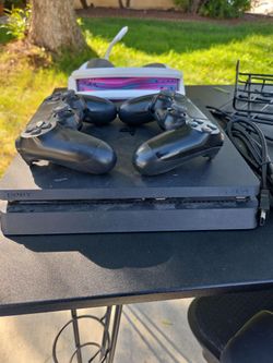 Playstation with 2 controllers and headset