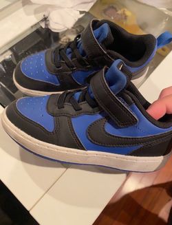 Black and blue Nikes  kids shoes