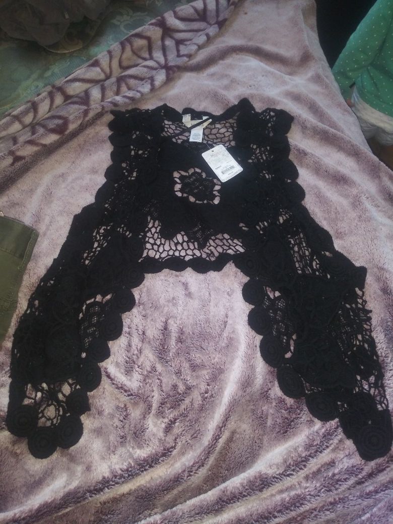 The Brand is mudd lacey shawl very cute