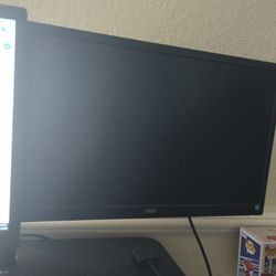 Selling Two Monitors AOC Flexible Dual monitor 360 Stand Included