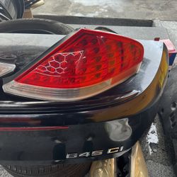 OEM passenger-side tail light for a 2004-2007 BMW 6-Series (E63 coupe or E64 convertible), including the 645ci, 650i, and M6 models