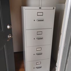 Two  Beige 4 Drawer File Cabinets