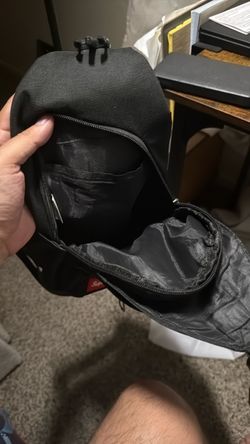 Black supreme cross body