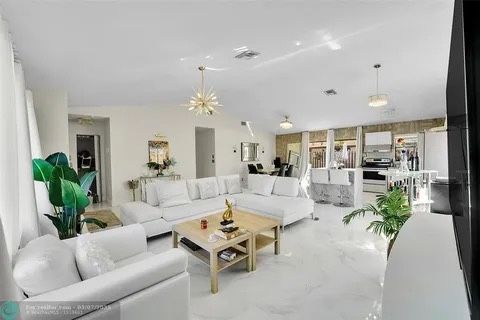 Modani Sectional Reclining Couch, Love Seat & Coffee Table