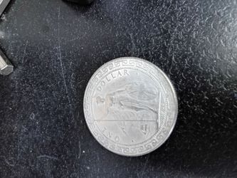 Silver British one dollar coin 1911