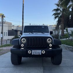 2014 Jeep Wrangler Unlimited Sport 4x4 — 4-door