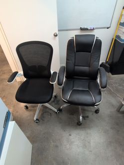 Two Black Office Chairs on Wheels