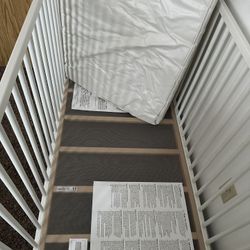baby crib, includes mattress
