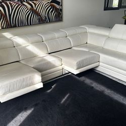 WHITE GENUINE LEATHER SECTIONAL SOFA W RETRACTABLE SEATS by QUEBEC 69 - LIKE NEW - delivery is negotiable