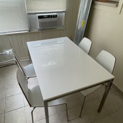 Table And 4 Chairs