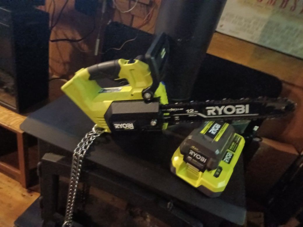 The 40 Volt Ryobi Chainsaw With Battery And Charger