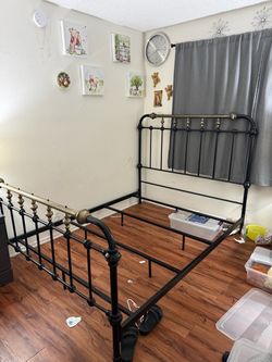 Black Metal Bed Frame with Gold Accents