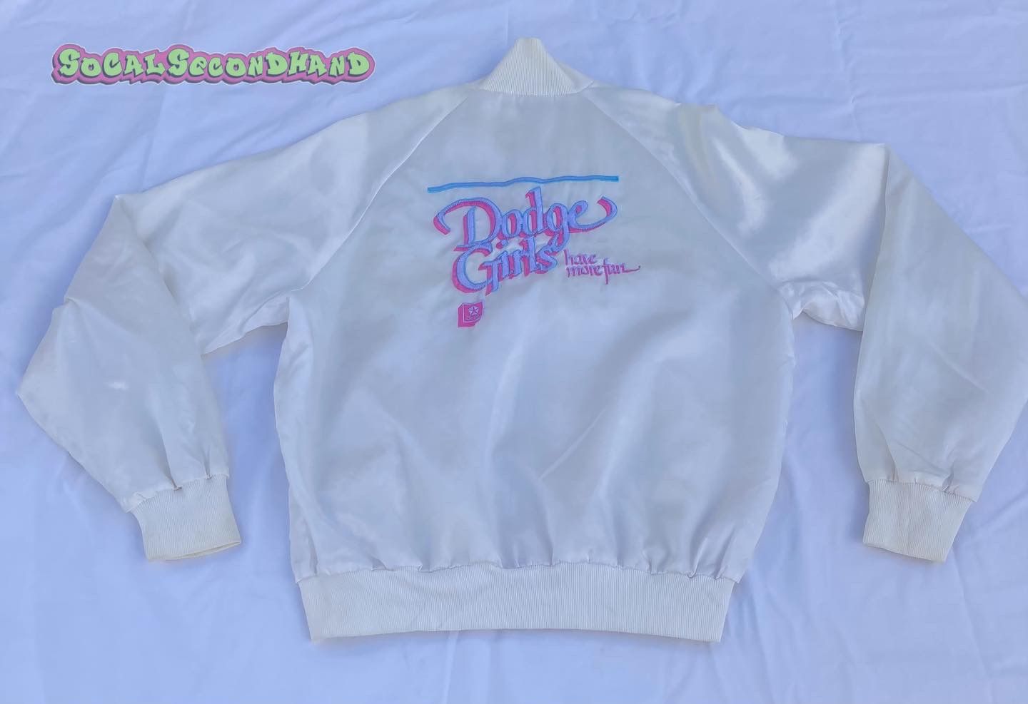 1980s Vintage Dodge Women’s Large bomber jacket white button up , made in USA . 100% nylon 25’ length 22’ pit to pit 22’ sleeve. Absolutely fantastic 