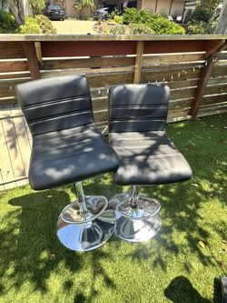 Set Of Spinning Adjustable Chairs And Seats