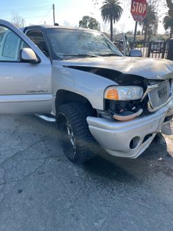 2005 GMC sierra Denali gold color