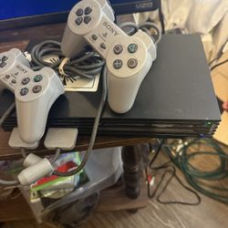 PlayStation 2 PS2 w/ 2 controllers $100, firm no trades, plus get 2 free games of choice from the games I have) additional game’s are $10 each, new hd