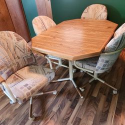 Table , Leaf, 4 Chairs. $ 150.00