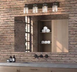 Calhoun Collection 30-1/4 in. 4-Light Antique Bronze Clear Glass Farmhouse Urban Industrial Bathroom Vanity Light. Progress Lighting Model # P300048
