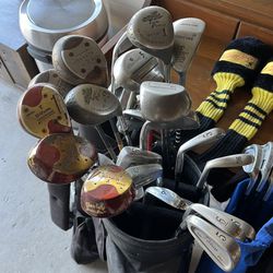 Various Golf Clubs And Bags