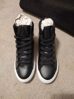 Black high top sneakers