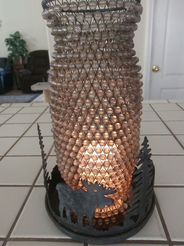 Candle holder with beaded shade