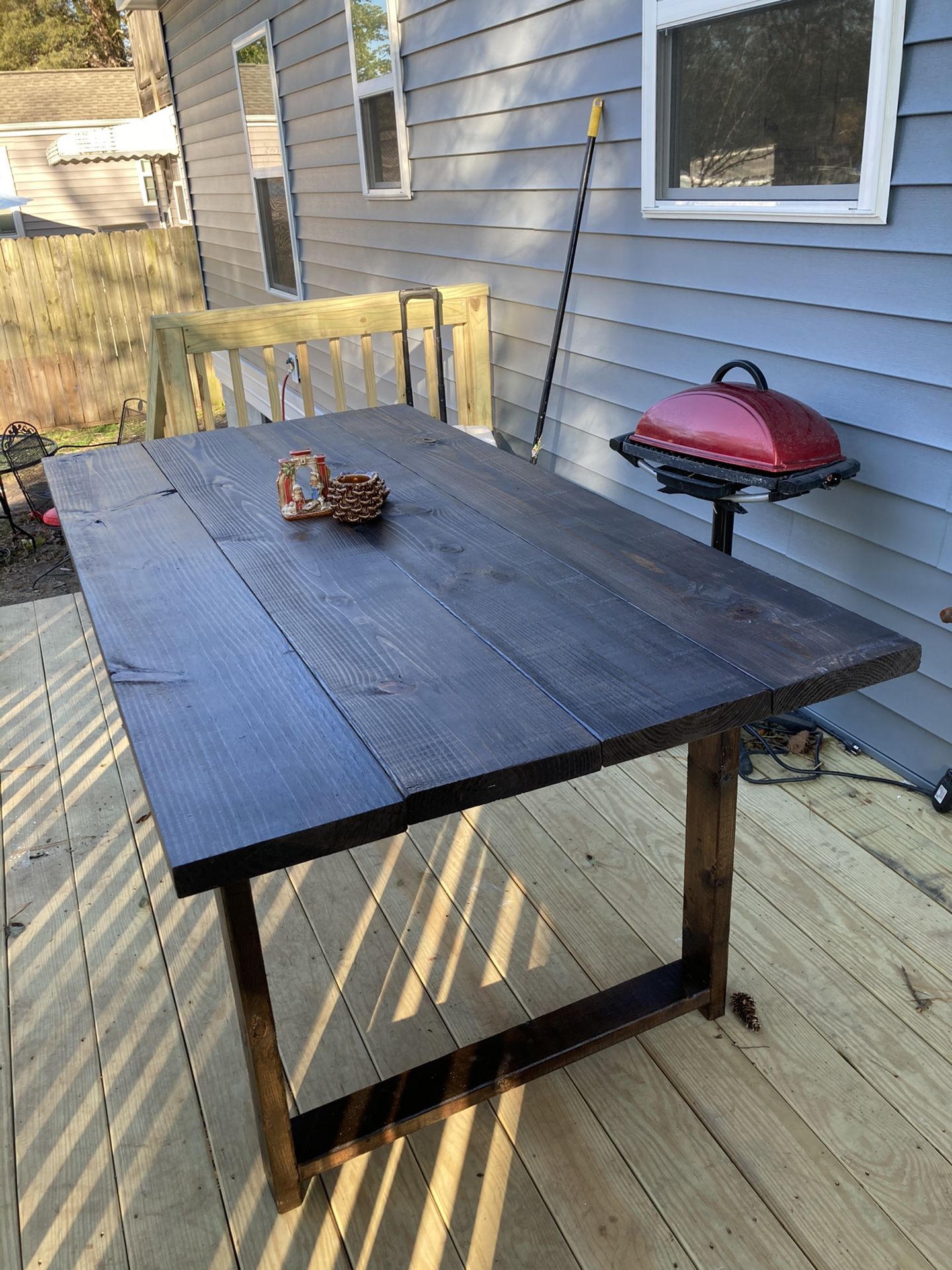 Inside/ outside weather treated wood table