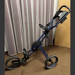 Blue Sun Mountain Pathfinder PX3 golf push cart with 3 wheels, storage bag, and handle. Folds up for storage.