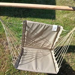 Tan And Black Hanging Swing Chairs