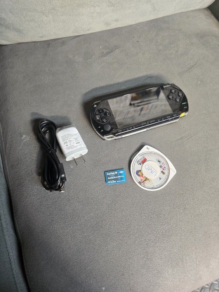 Sony PSP 1001 tested and working with new battery, charger, storage, and game