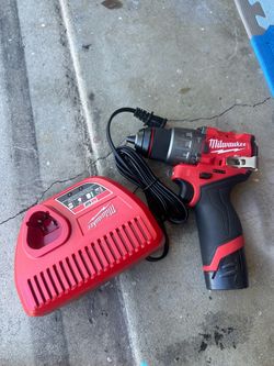 Milwaukee m12 fuel hammer drill with 2.0 battery and charger like new